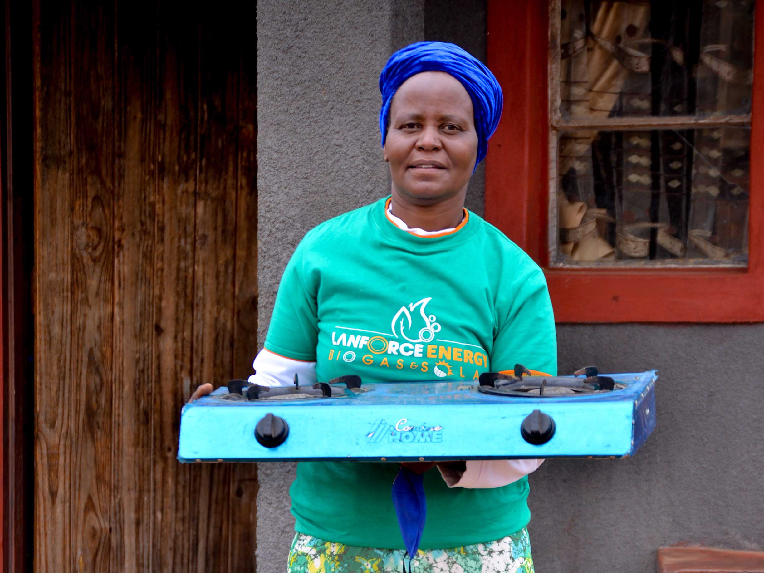 woman working with clean cooking in Zimbabwe